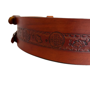 Side view of brown leather double buckle belt with Celtic knot, detail