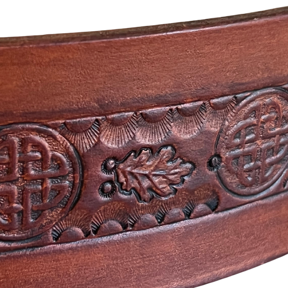 Wide leather Belt displaying hand stamped Celtic knots and leaf pattern detail